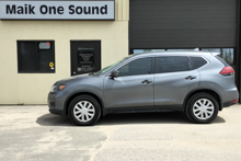 White 2019 Nissan Rogue with sleek dark privacy tint